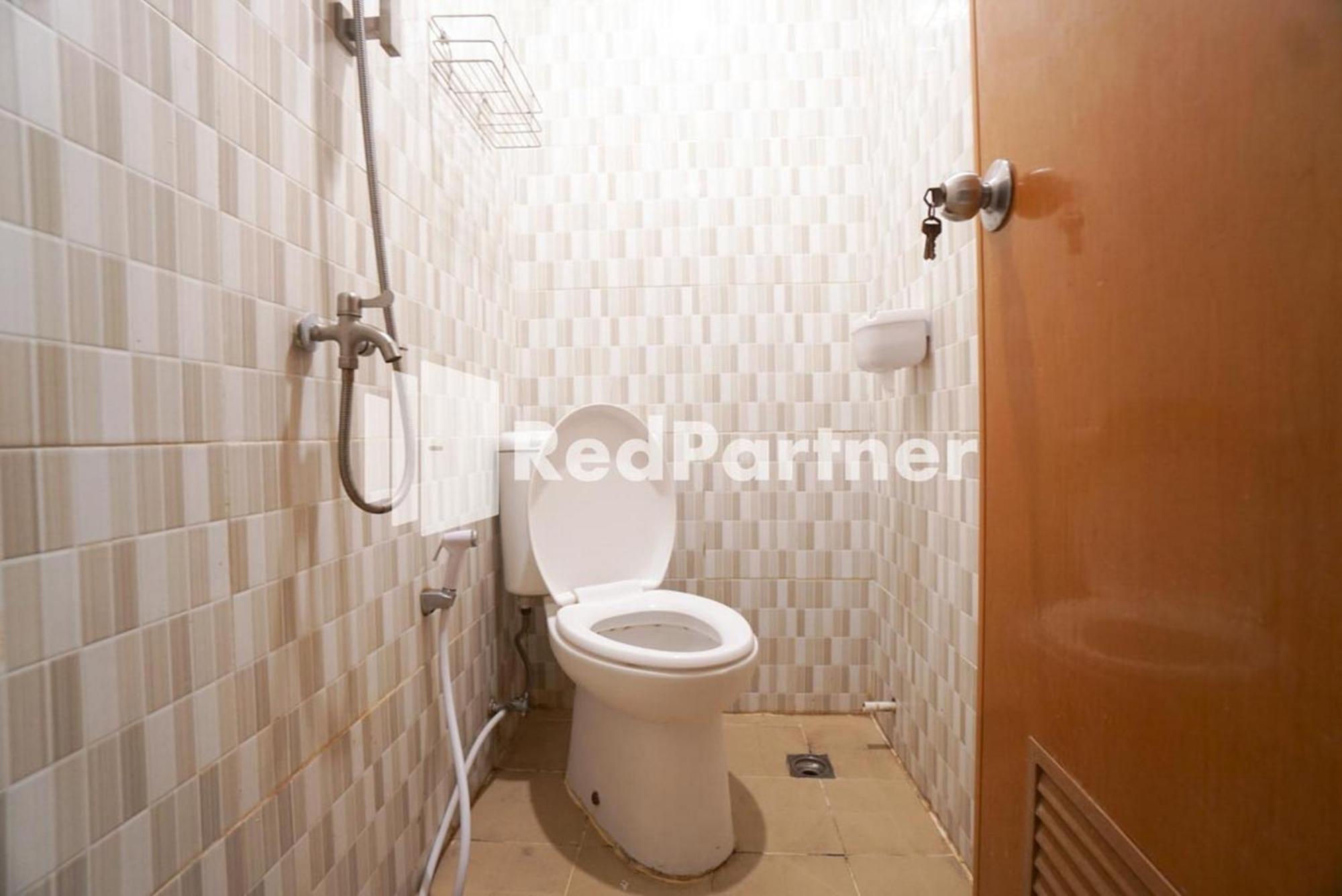 Eascot Hotel Mitra Reddoorz Jakarta Rom bilde